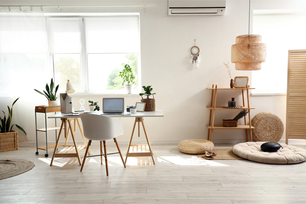 Bright home office with light flooring, a desk, and natural wood decor | Flemington Department Store